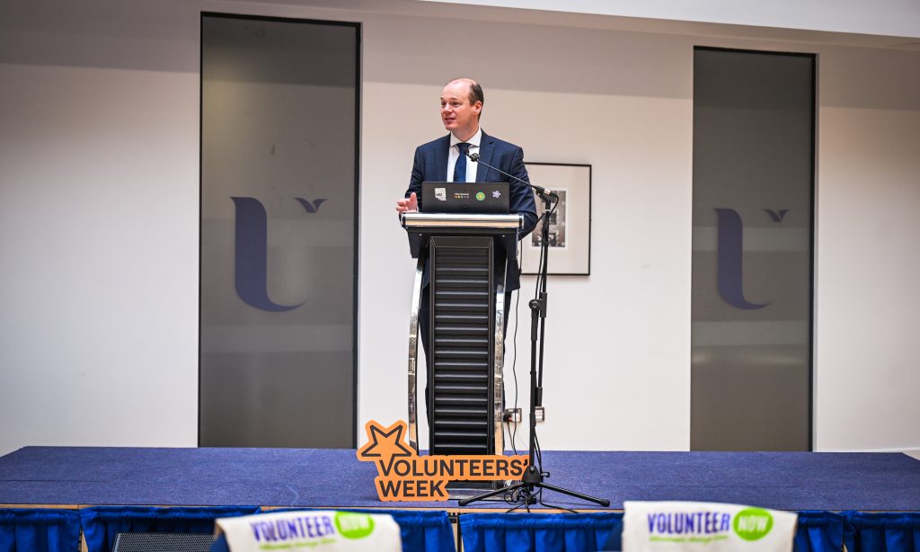 Minister Lyons speaking at the conference